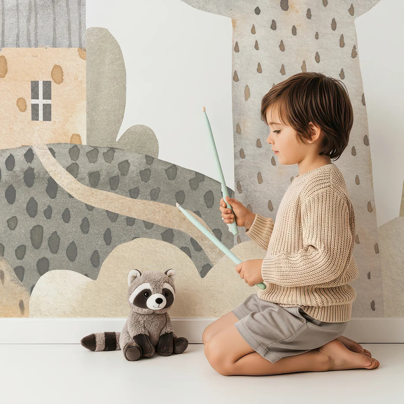Child in front of Whimsy Tots Neutral Town Street Wall Mural with town, house, watercolor, rustic, village, european, brown, neutral in design.