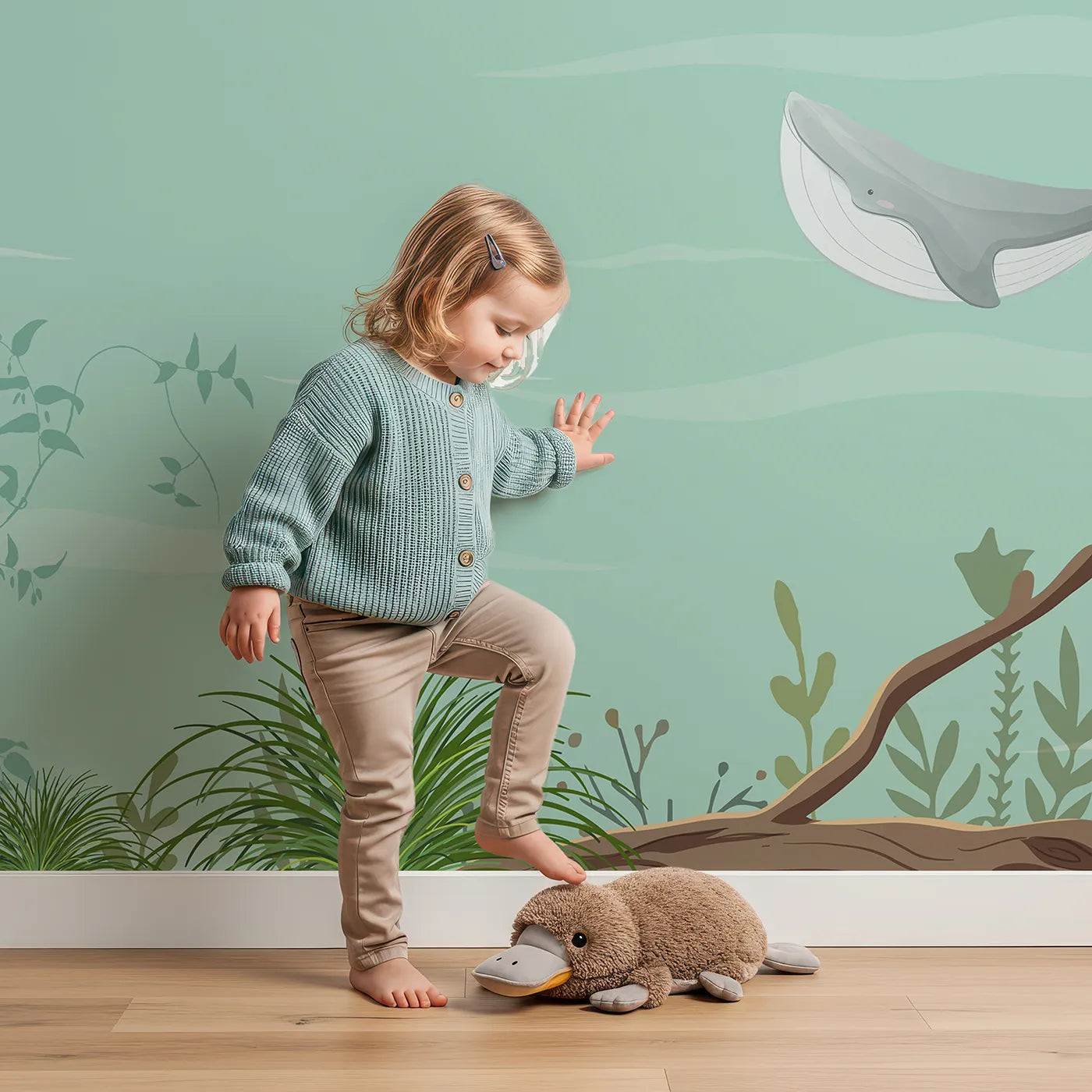 Child in front of Whimsy Tots Woodland River Adventure Wall Mural with animal, woodland, river, boat, cute, whimsical, raccoon, mouse in design.