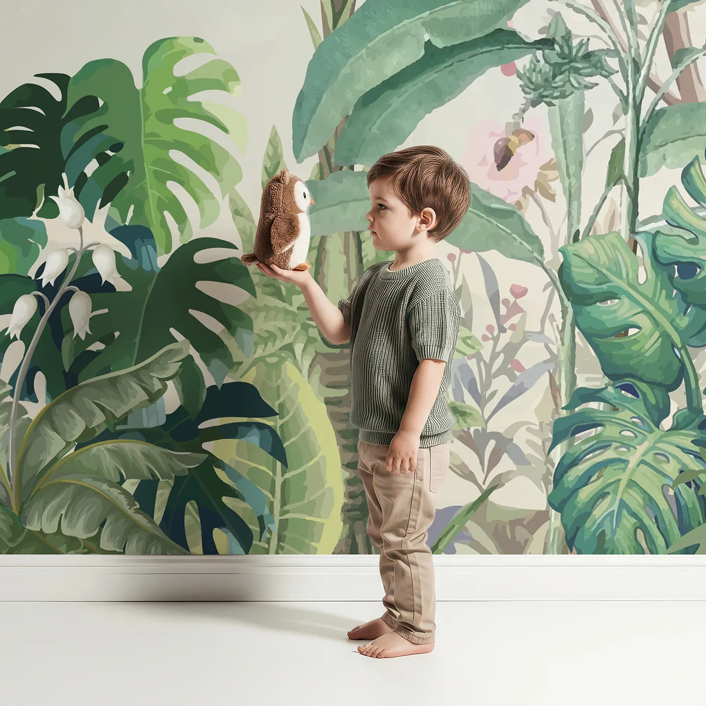 Child in front of Whimsy Tots Tropical Bird Garden Wall Mural in Green with chinoiserie, vintage, bird, exotic, tropical, classic, garden, hummingbird in design.