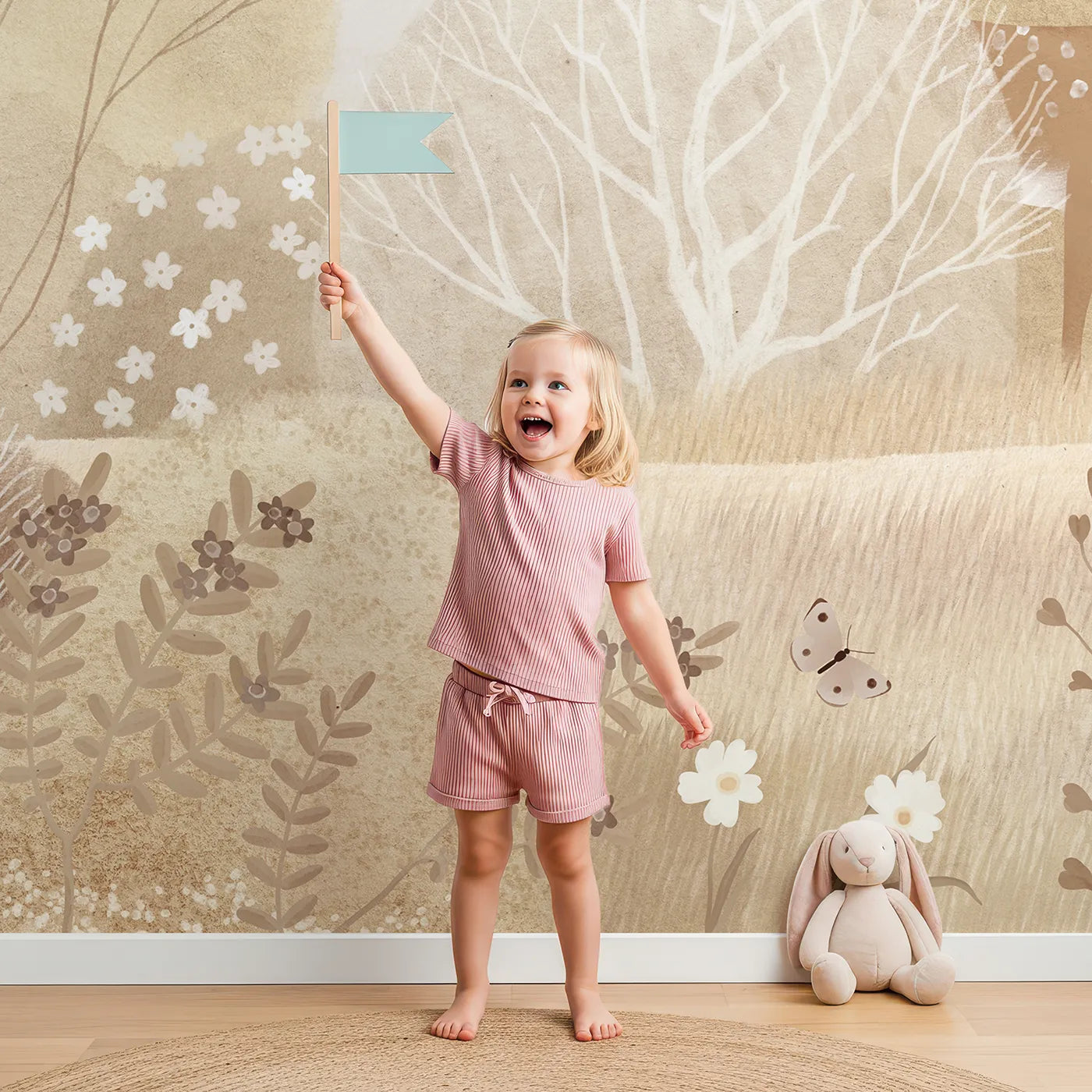 Child in front of Whimsy Tots Sepia Woodland Wall Mural with woodland, animal, forest, deer, fawn, cute, beige, misty in design.