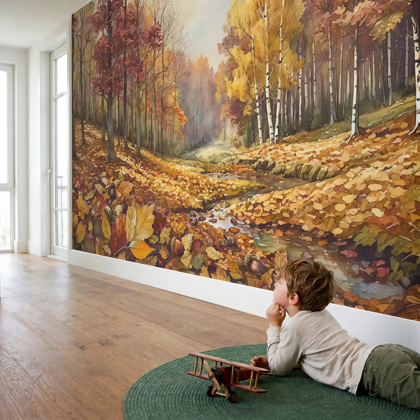 Child in nursery with Autumn Leaf Carpet Forest Wallpaper Mural by Whimsy Tots