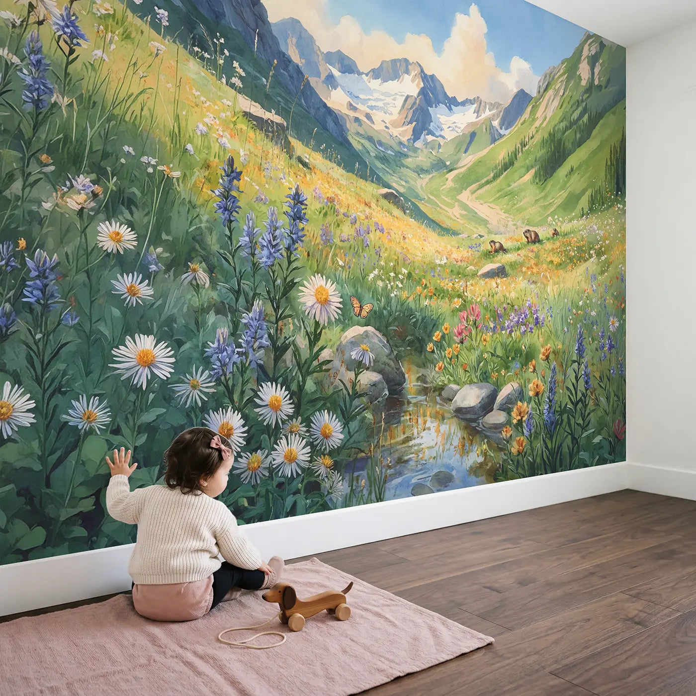 Child in nursery with Alpine Wildflower Meadow Wallpaper Mural by Whimsy Tots