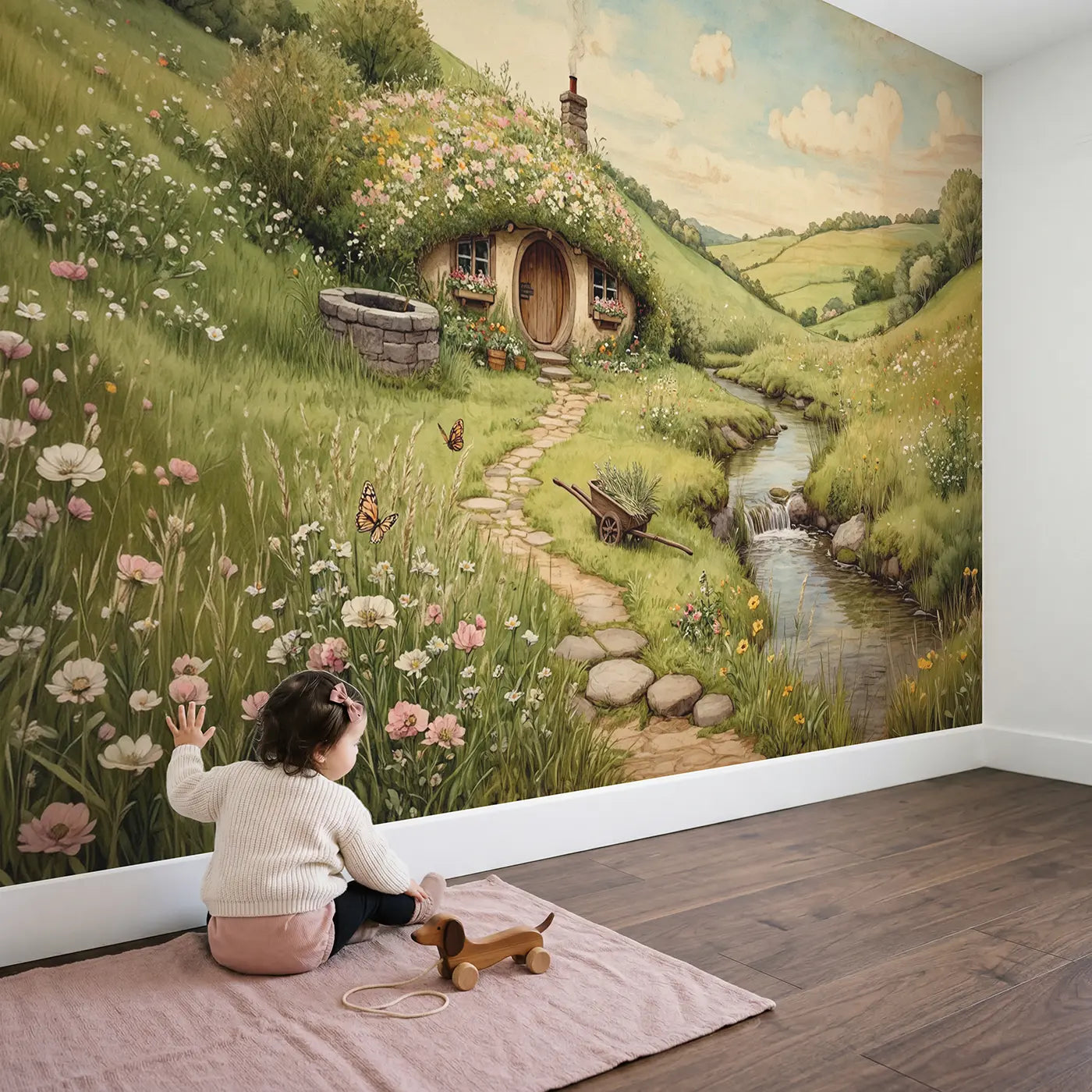 Child in nursery with Wildflower Hill Cottage Wallpaper Mural by Whimsy Tots