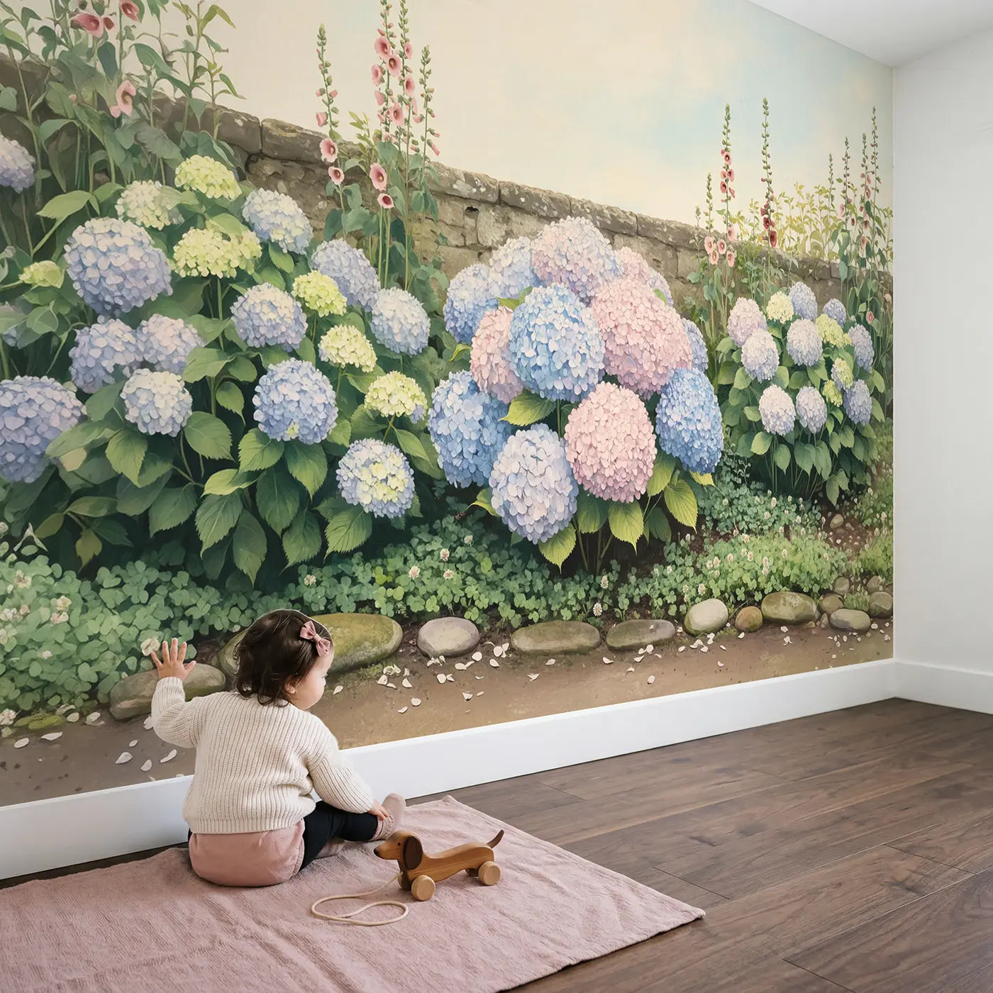Child in nursery with Soft Hydrangea Bloom Wallpaper Mural by Whimsy Tots