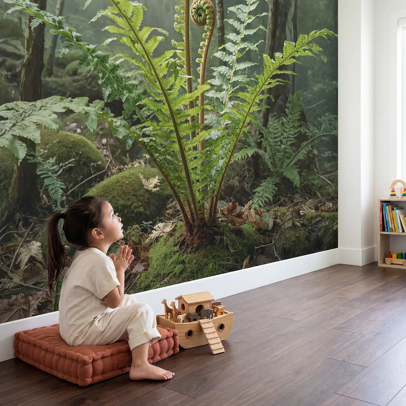 Child in nursery with Unfurling Fern Spiral Wallpaper Mural by Whimsy Tots