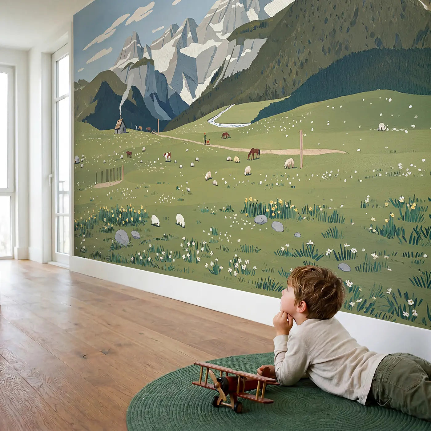 Child in nursery with Highland Meadow Grazing Wallpaper Mural by Whimsy Tots