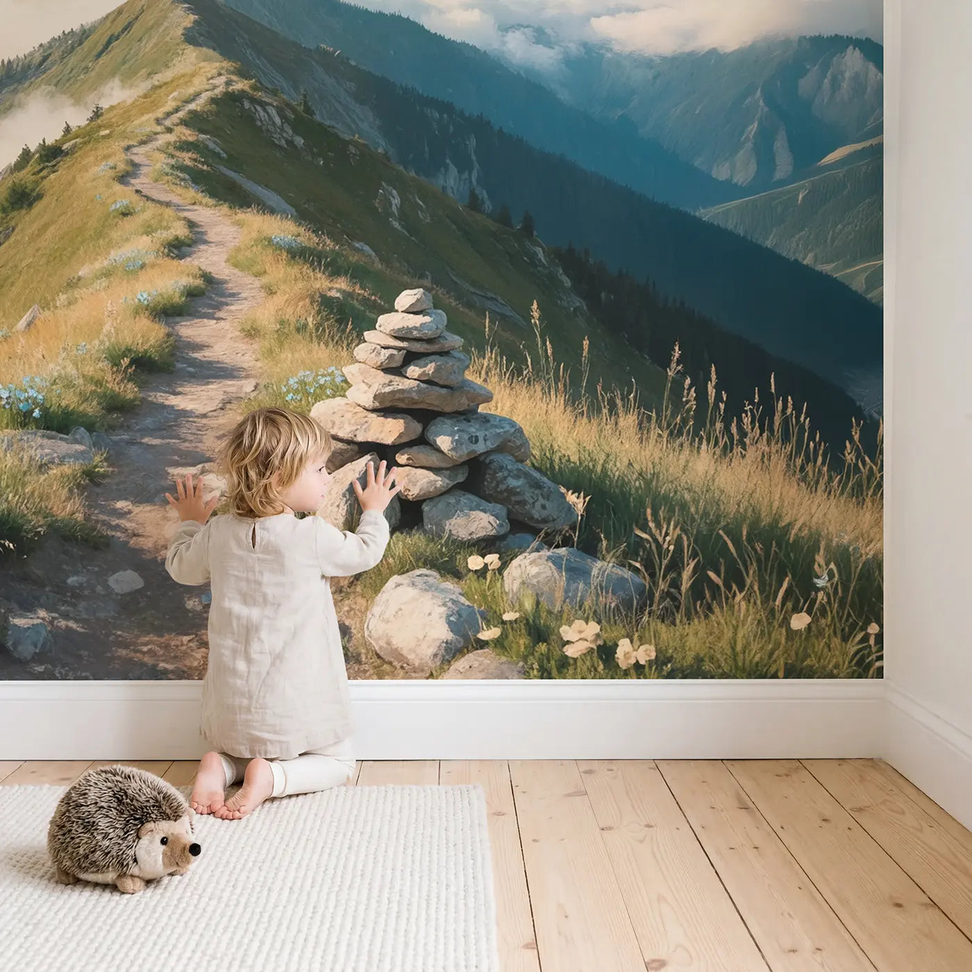 Child in nursery with Sky Ridge Mountain Walk Wallpaper Mural by Whimsy Tots