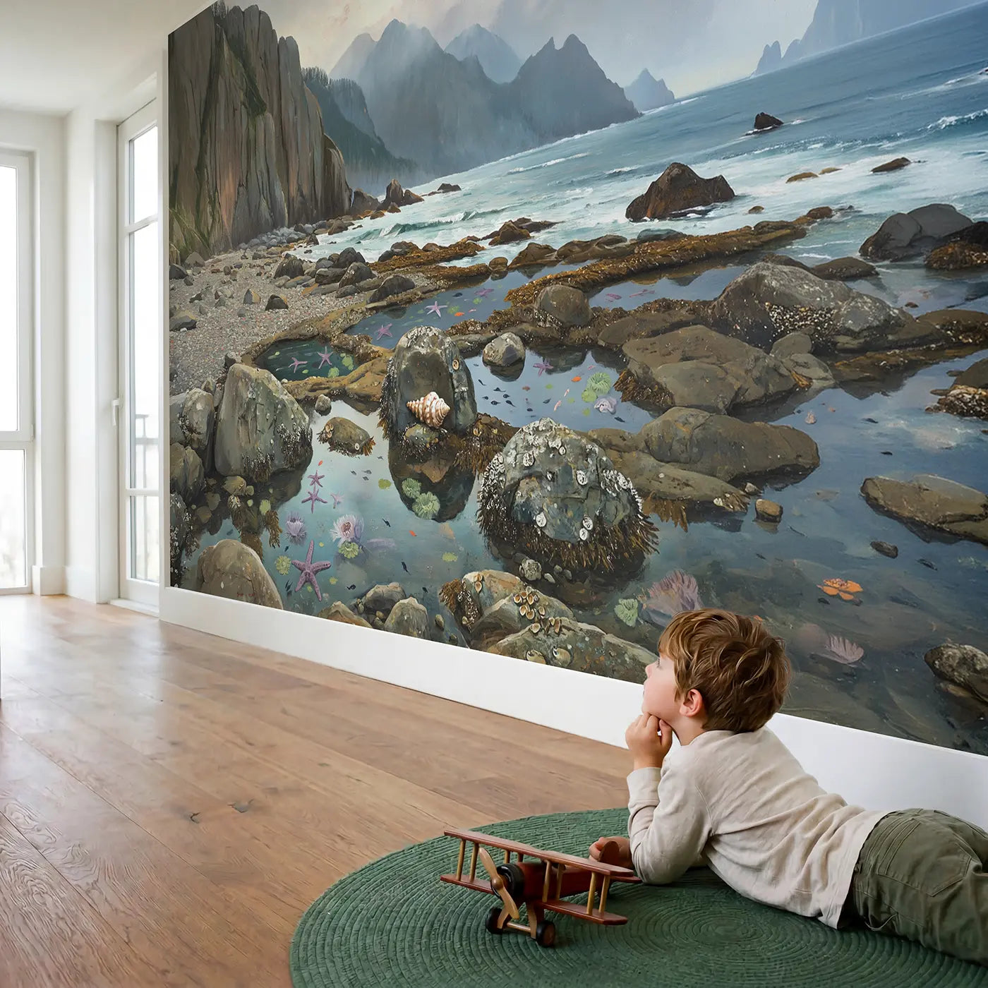 Child in nursery with Mountain Tide Pool Shore Wallpaper Mural by Whimsy Tots