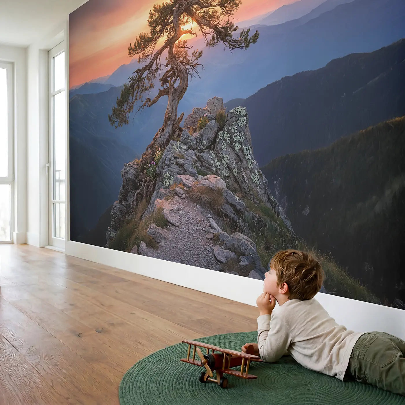 Child in nursery with Ancient Windswept Pine Summit Wallpaper Mural by Whimsy Tots