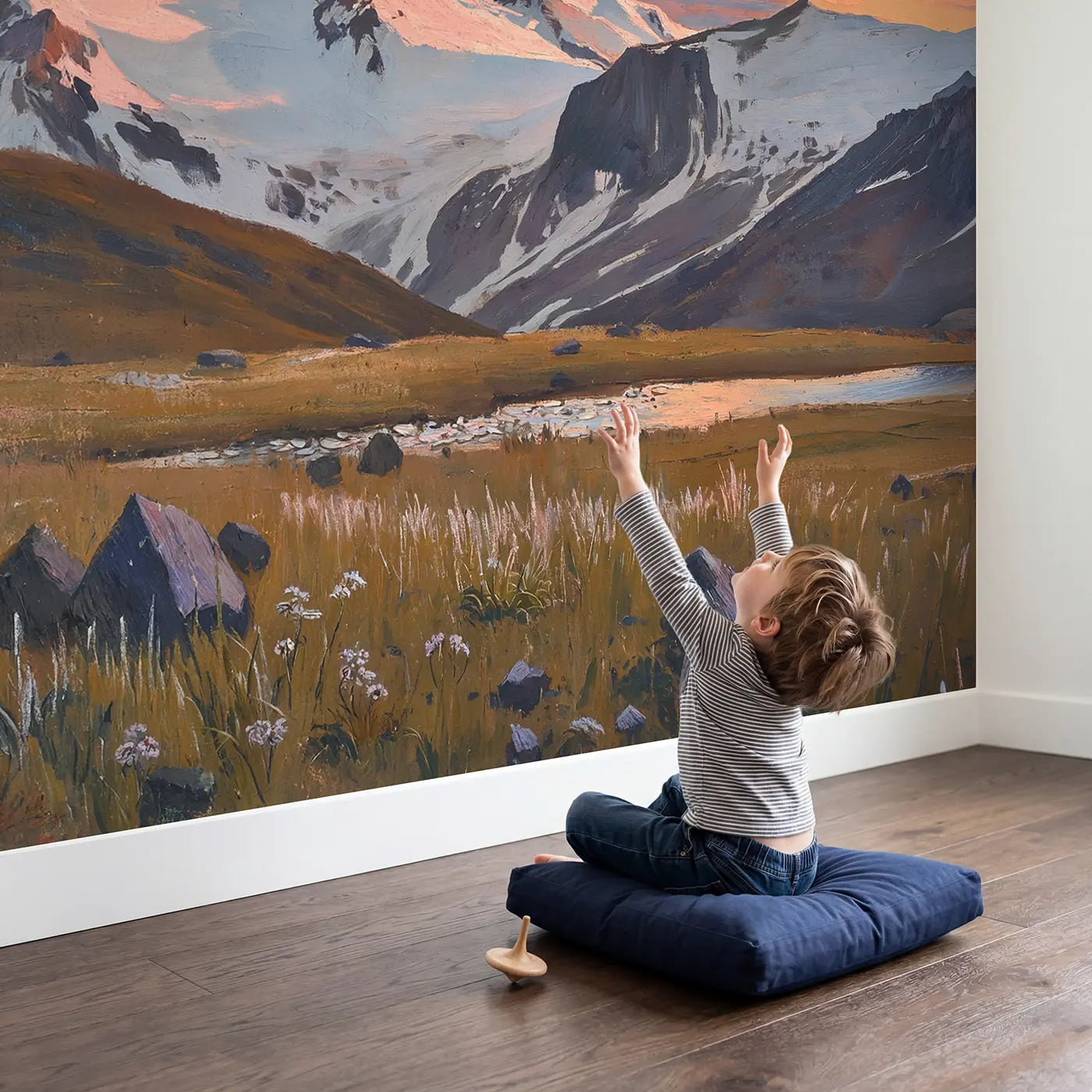Child in nursery with Alpenglow Rose Gold Peaks Wallpaper Mural by Whimsy Tots