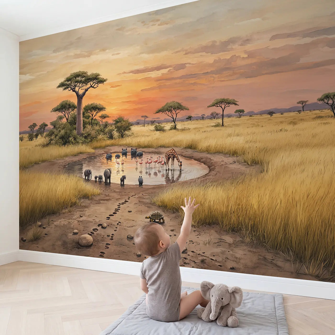 Child in nursery with Sunset Safari Watering Hole Wallpaper Mural by Whimsy Tots