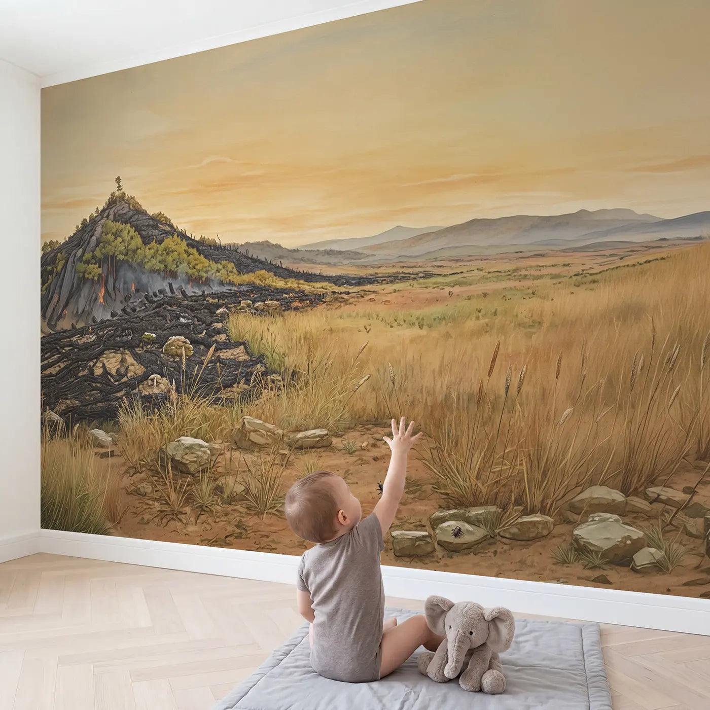 Child in nursery with Grassland Fire Line Regrowth Wallpaper Mural by Whimsy Tots