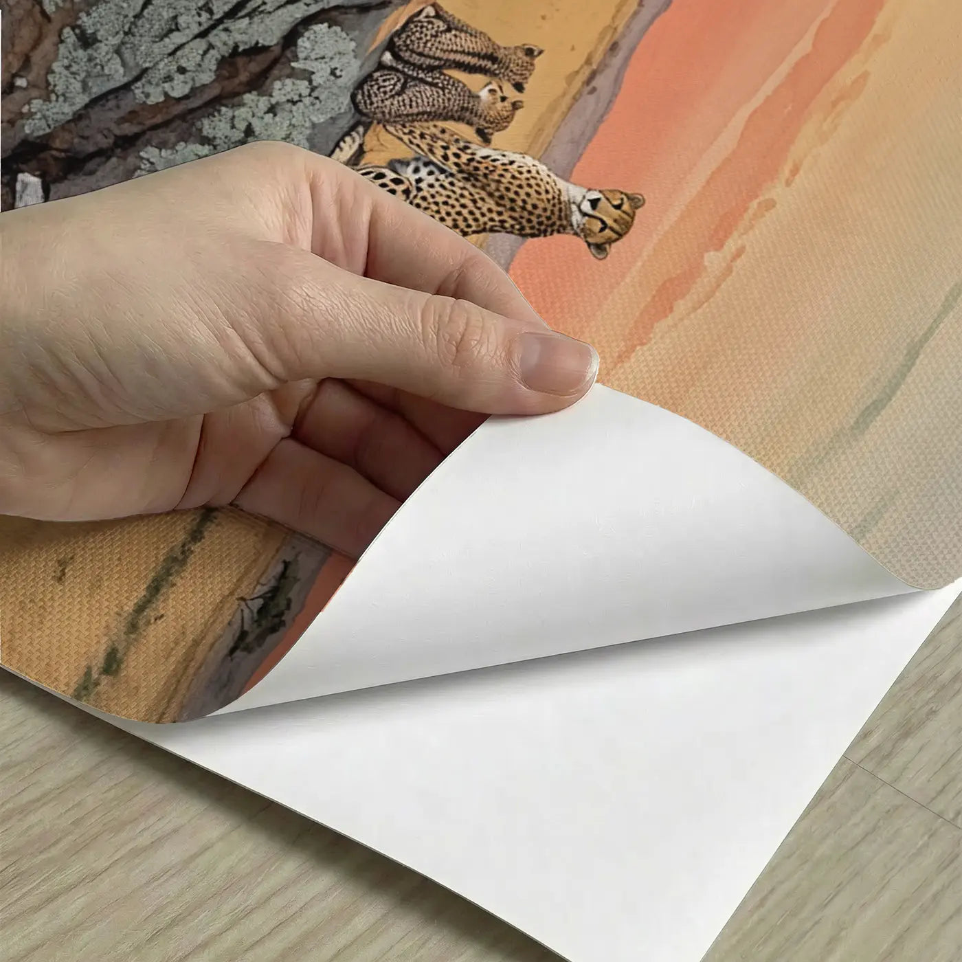 Peel-and-stick detail of Cheetah Family Sunset Kopje Wallpaper Mural by Whimsy Tots
