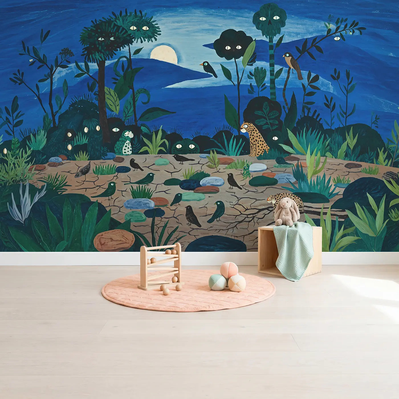 Nocturnal Safari Scene Eyes Wallpaper Mural in playroom setting by Whimsy Tots