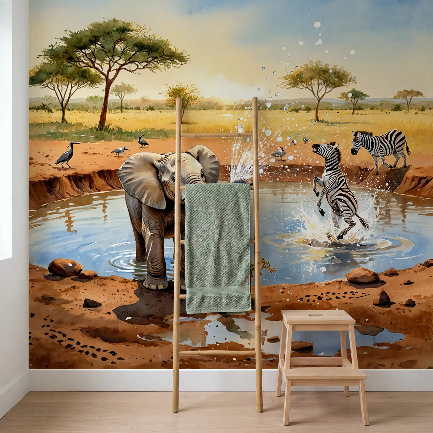 Elephant Spraying Zebra Waterhole Wallpaper Mural in playroom setting by Whimsy Tots
