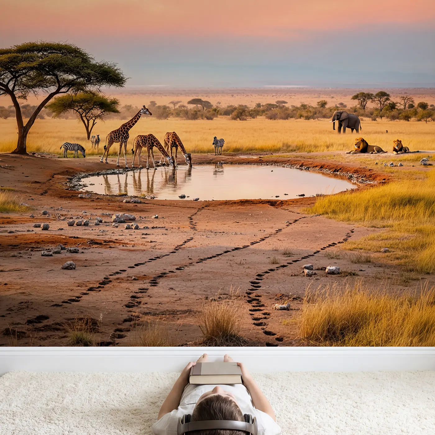 Child in nursery with Savanna Waterhole Dawn Wallpaper Mural by Whimsy Tots