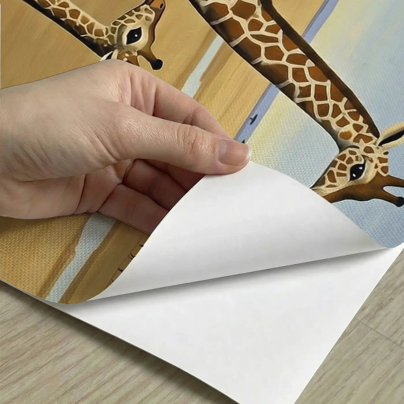 Peel-and-stick detail of Baby Giraffe First Steps Wallpaper Mural by Whimsy Tots