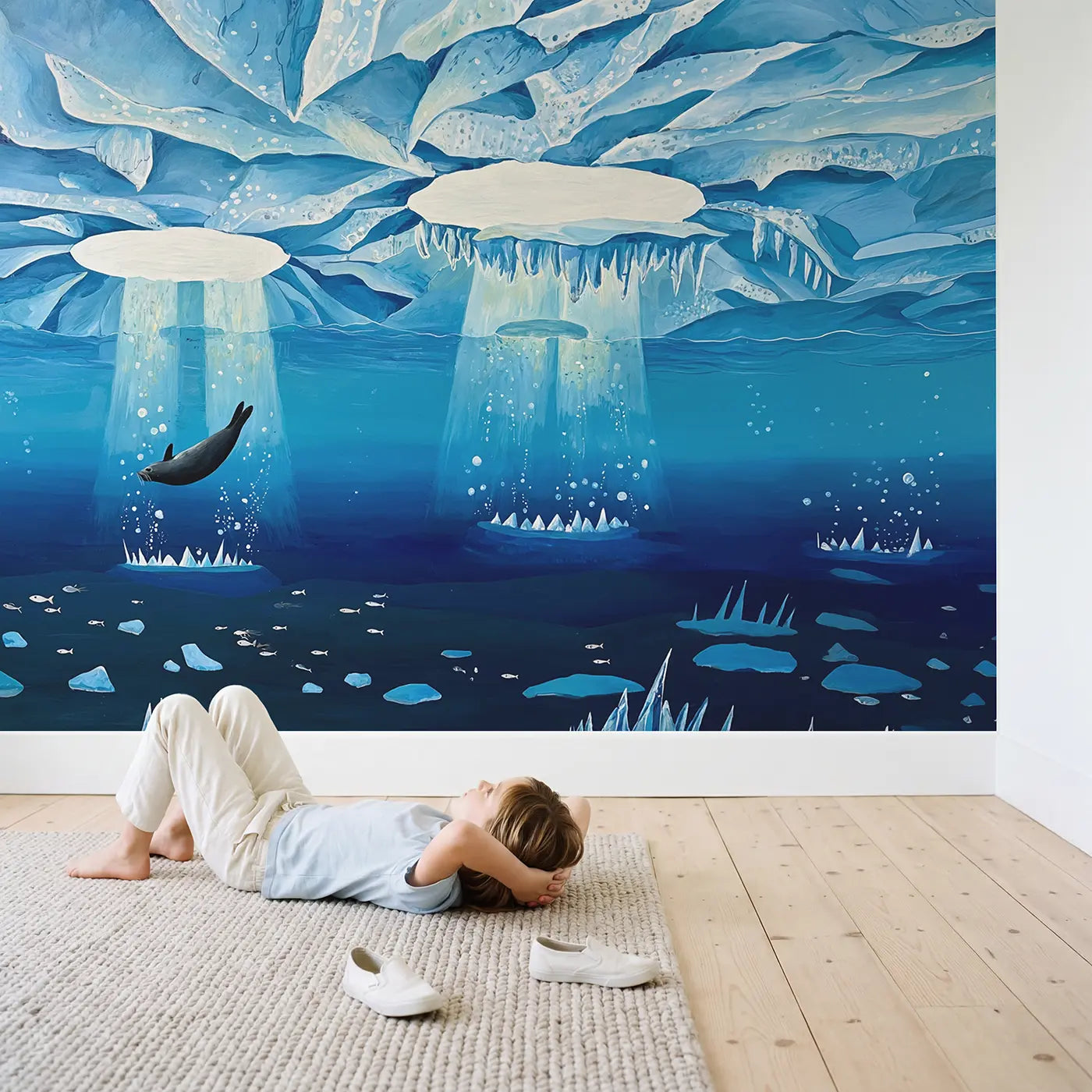 Child in nursery with Under Arctic Ice Wallpaper Mural by Whimsy Tots