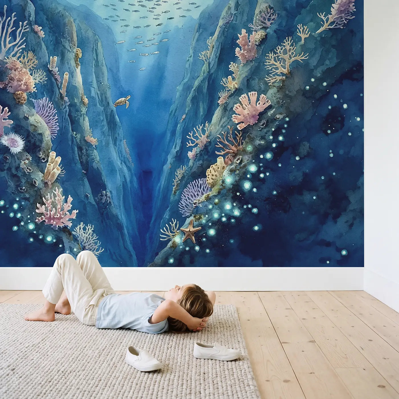 Child in nursery with Deep Ocean Canyon Wallpaper Mural by Whimsy Tots