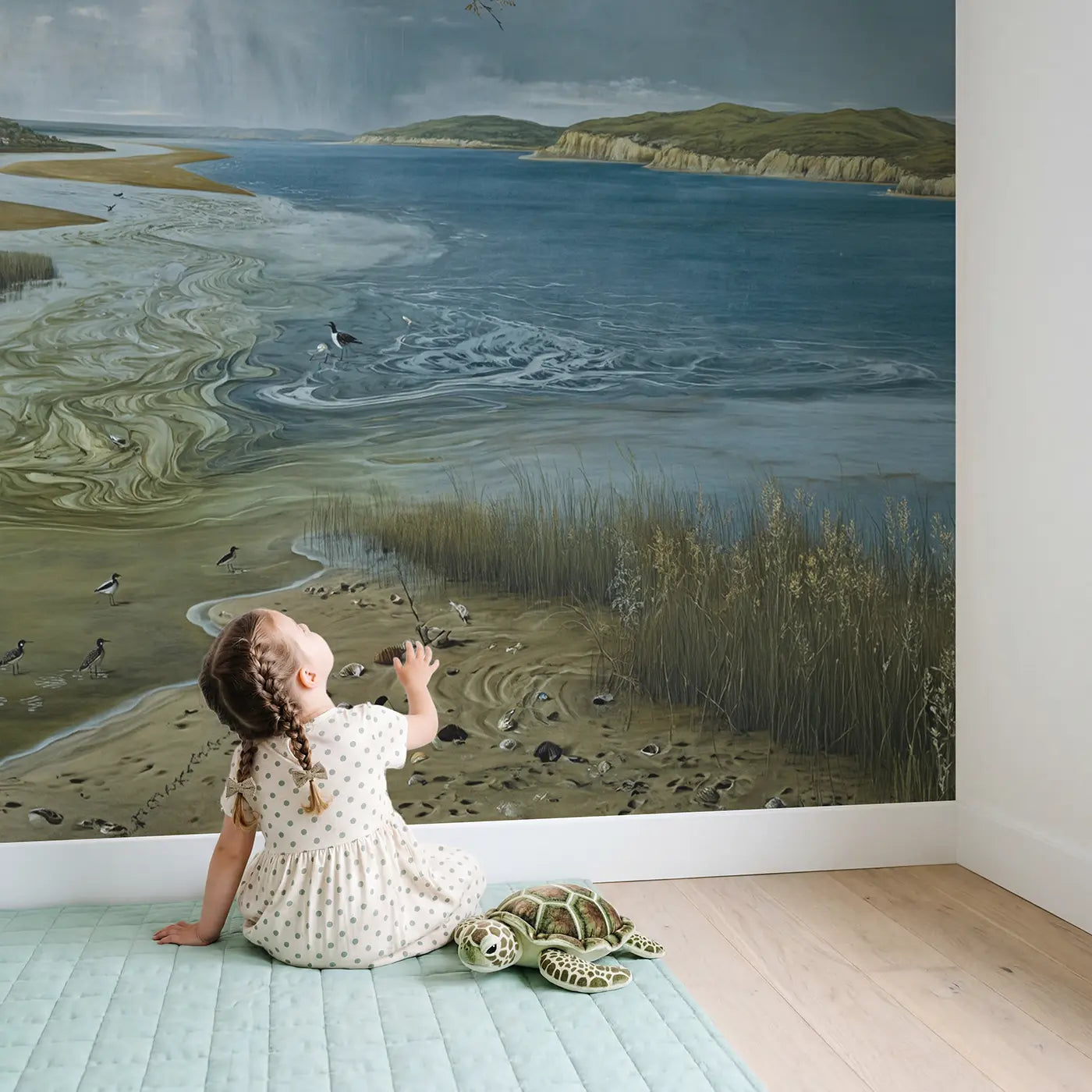 Child in nursery with Estuary River Meets Sea Wallpaper Mural by Whimsy Tots