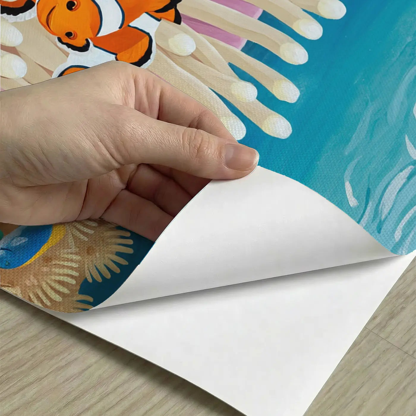 Peel-and-stick detail of Clownfish Anemone Home Wallpaper Mural by Whimsy Tots