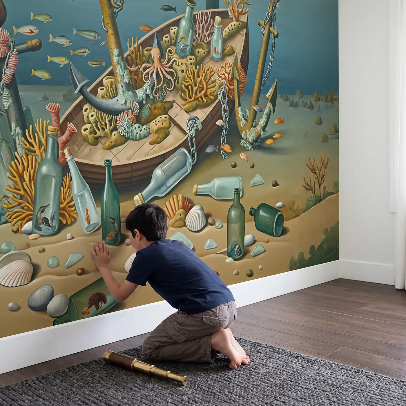 Child in nursery with Harbor Floor Found Reef Wallpaper Mural by Whimsy Tots