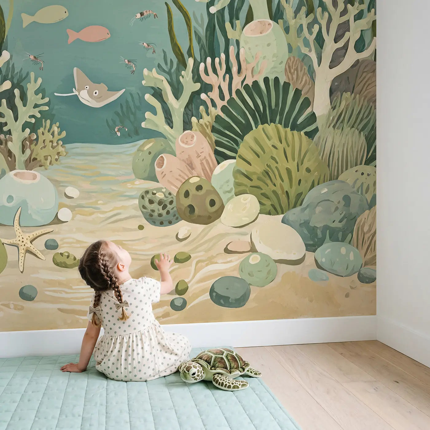Child in nursery with Gentle Sea Turtle Nursery Wallpaper Mural by Whimsy Tots