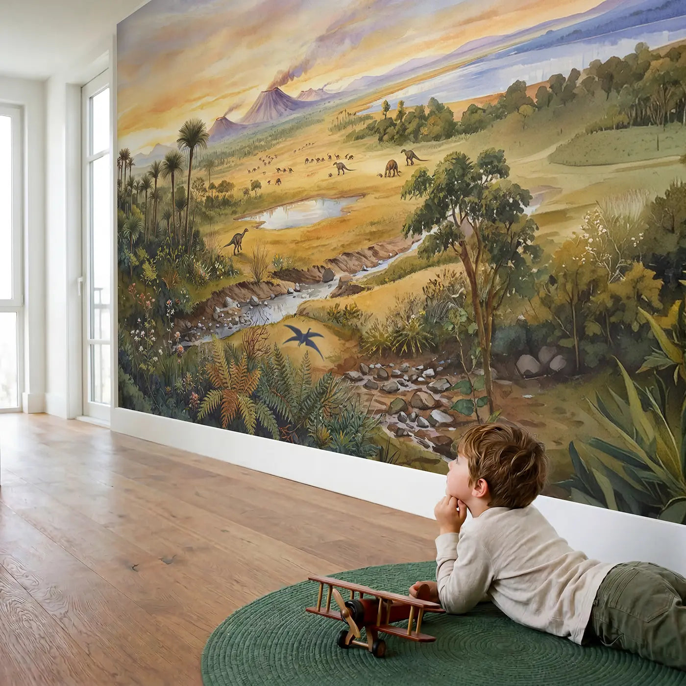 Child in nursery with Prehistoric Plains Panorama Wallpaper Mural by Whimsy Tots