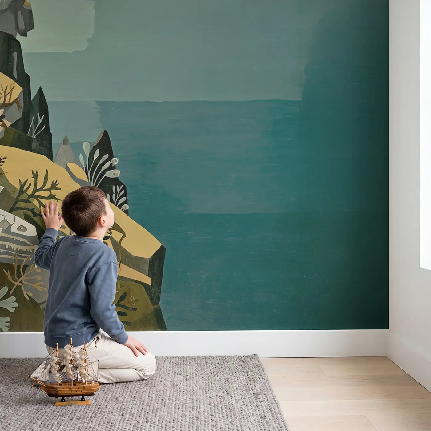 Child in nursery with Cliff Edge Pterodactyl Dawn Wallpaper Mural by Whimsy Tots