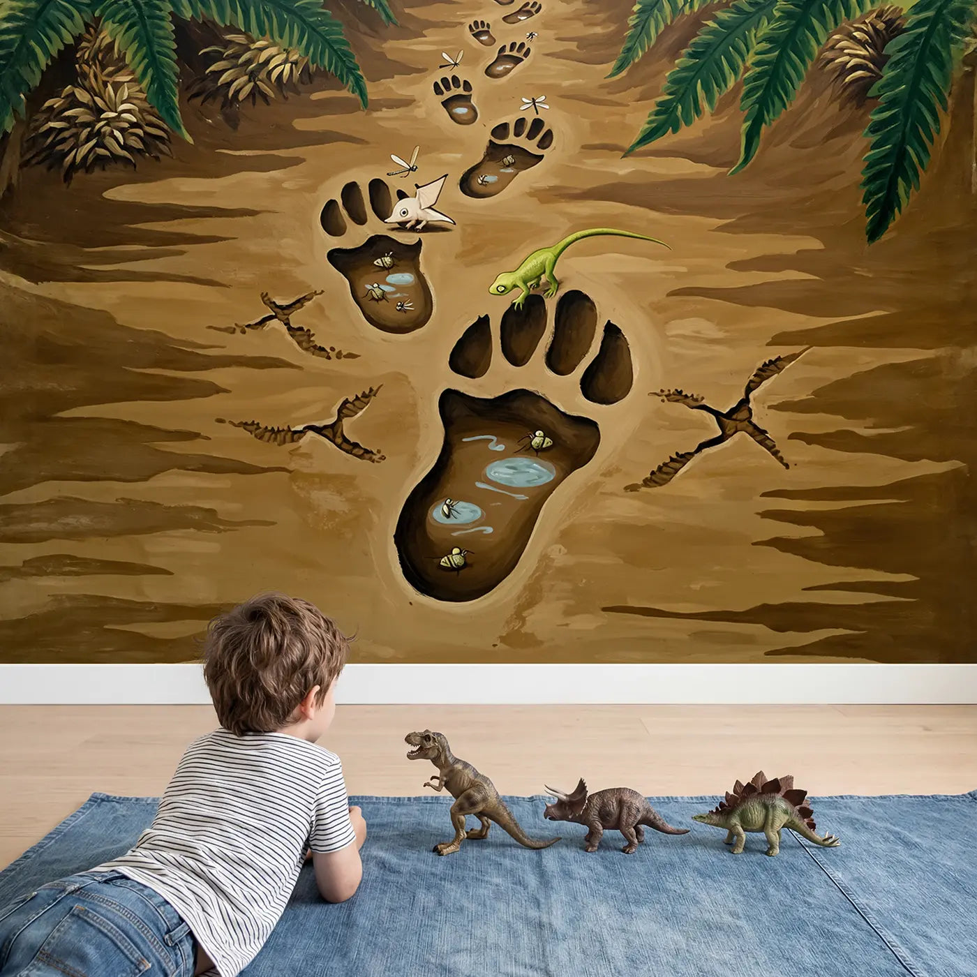 Child in nursery with Dinosaur Footprint Trail Wallpaper Mural by Whimsy Tots