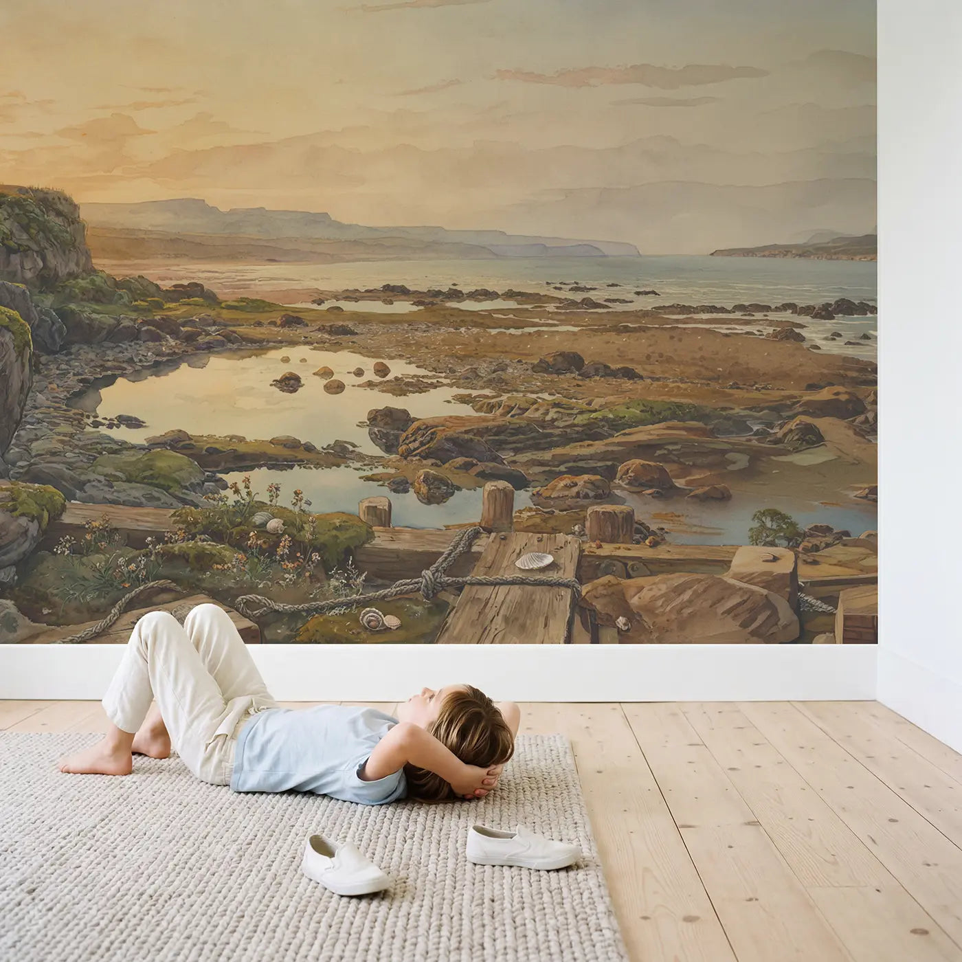 Child in nursery with Prehistoric Coastline Rocky Pools Wallpaper Mural by Whimsy Tots