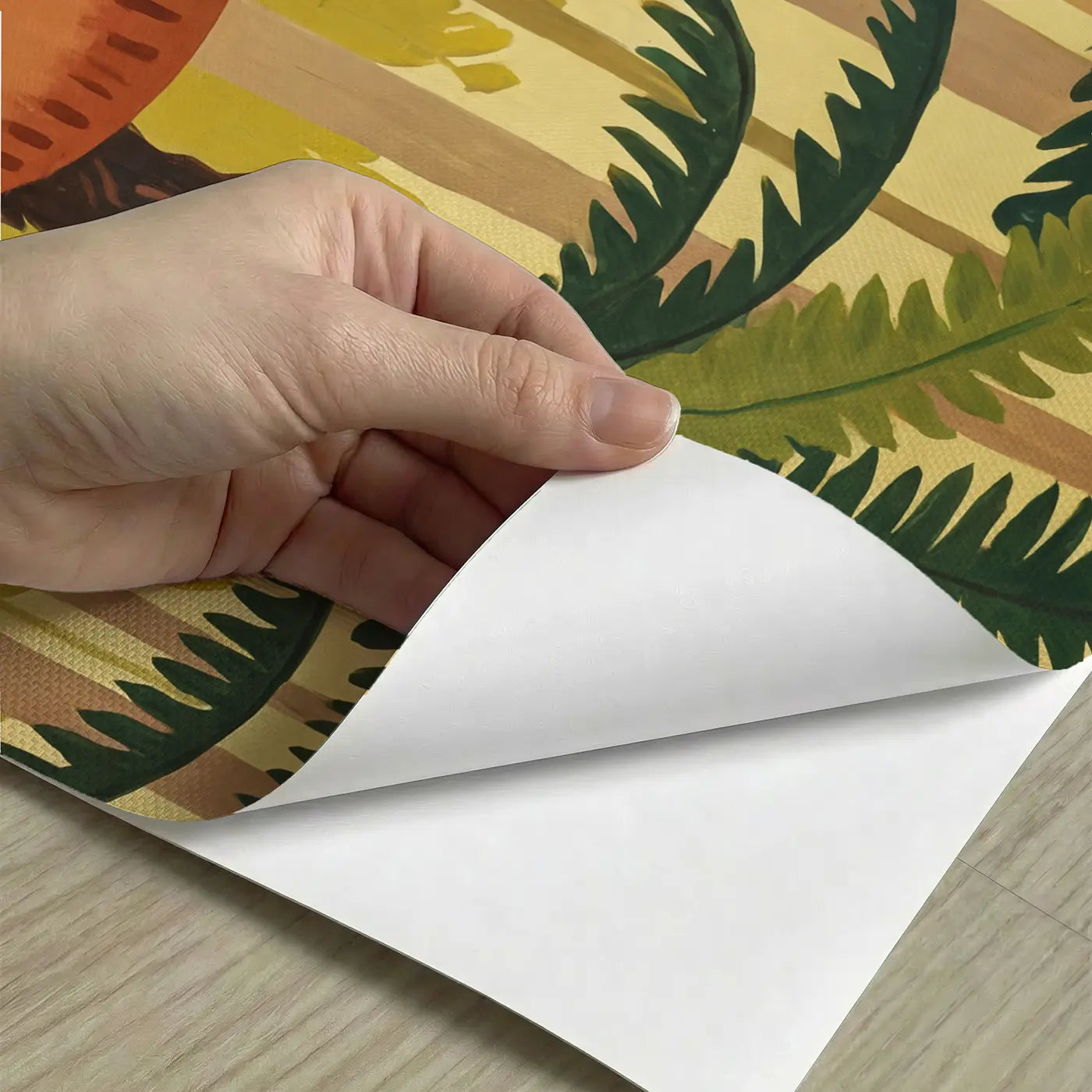 Peel-and-stick detail of Friendly Triceratops Fern Forest Wallpaper Mural by Whimsy Tots