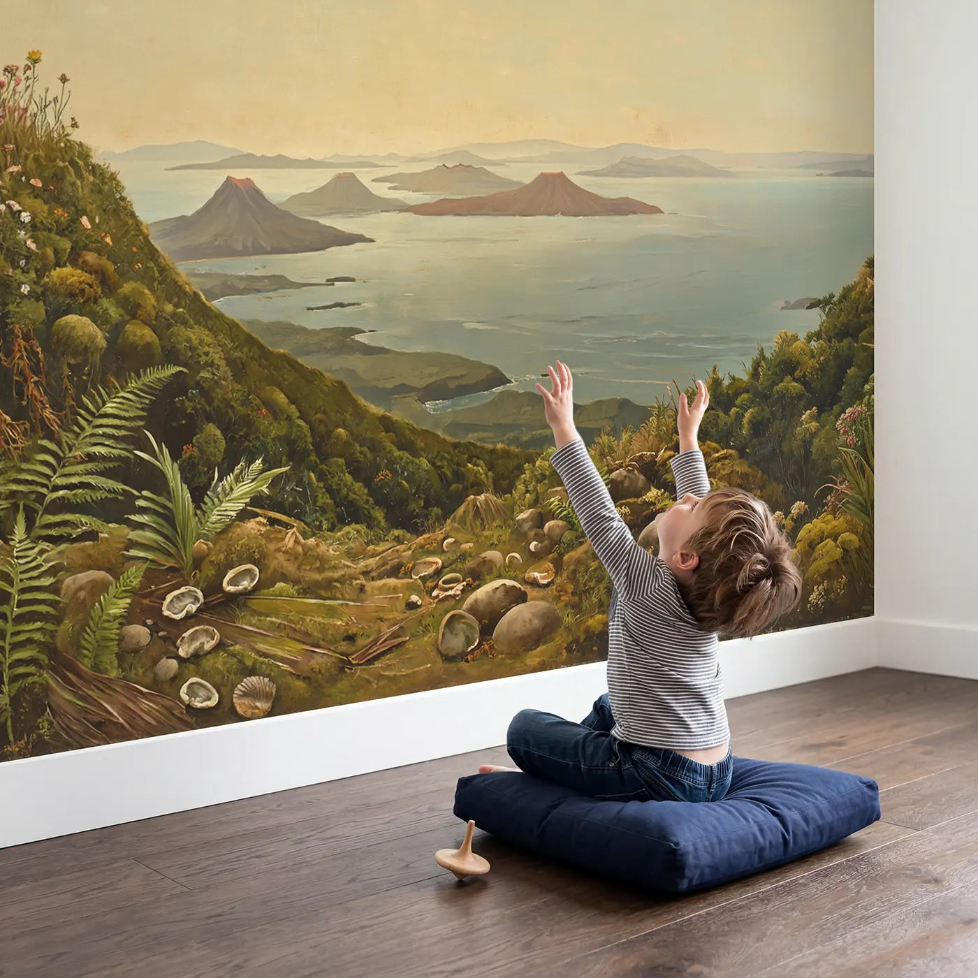 Child in nursery with Volcanic Island Chain Prehistoric Wallpaper Mural by Whimsy Tots