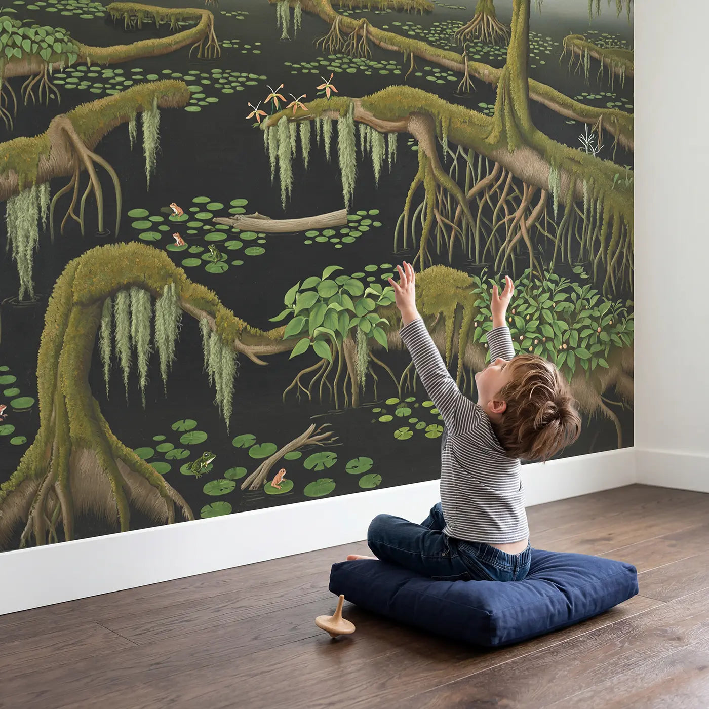 Child in nursery with Prehistoric Swamp at Dawn Wallpaper Mural by Whimsy Tots