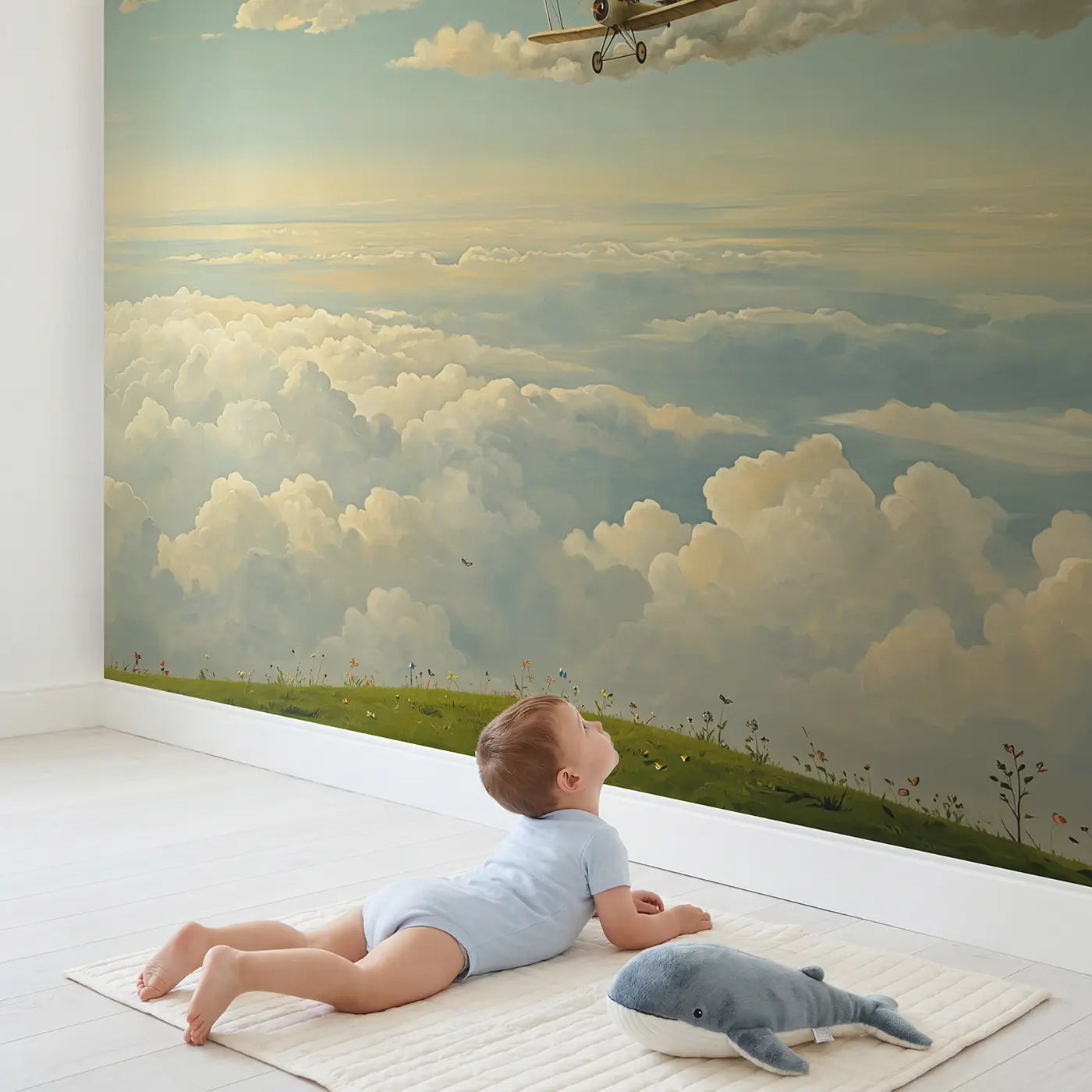 Child in nursery with Vintage Biplane Among Clouds Wallpaper Mural by Whimsy Tots