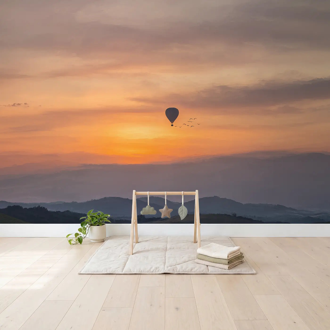 Sunset Sky Balloon Wallpaper Mural in playroom setting by Whimsy Tots