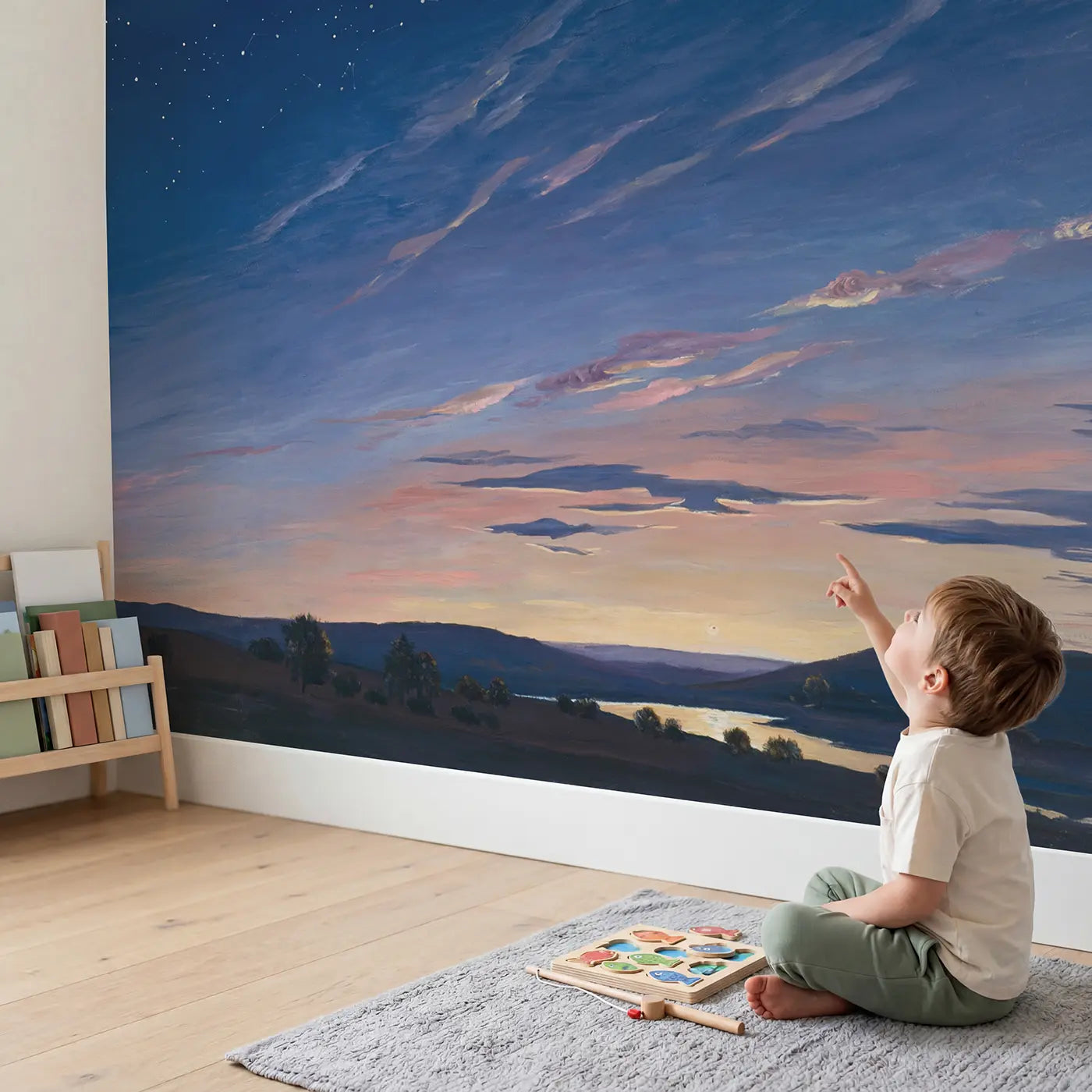 Child in nursery with Dawn Sky Transition Wallpaper Mural by Whimsy Tots