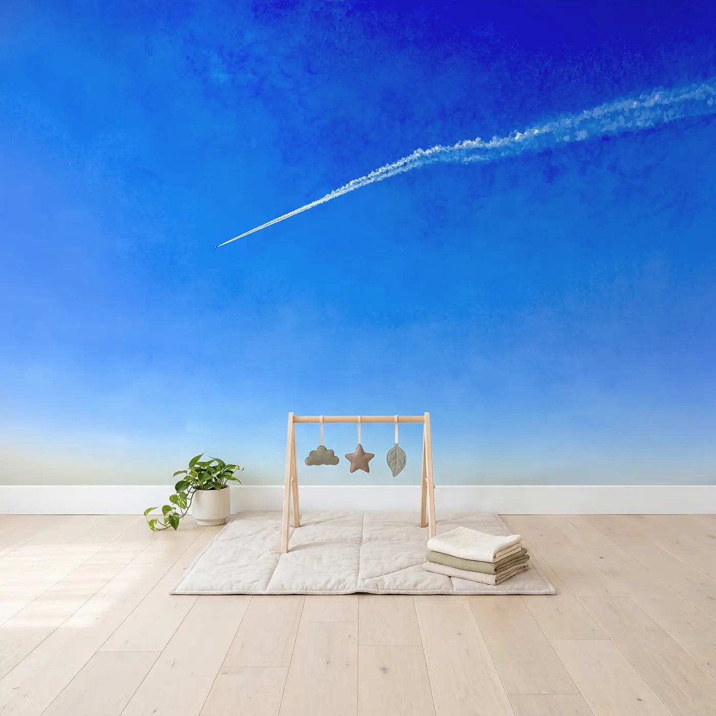 Lone Contrail Blue Sky Wallpaper Mural in playroom setting by Whimsy Tots