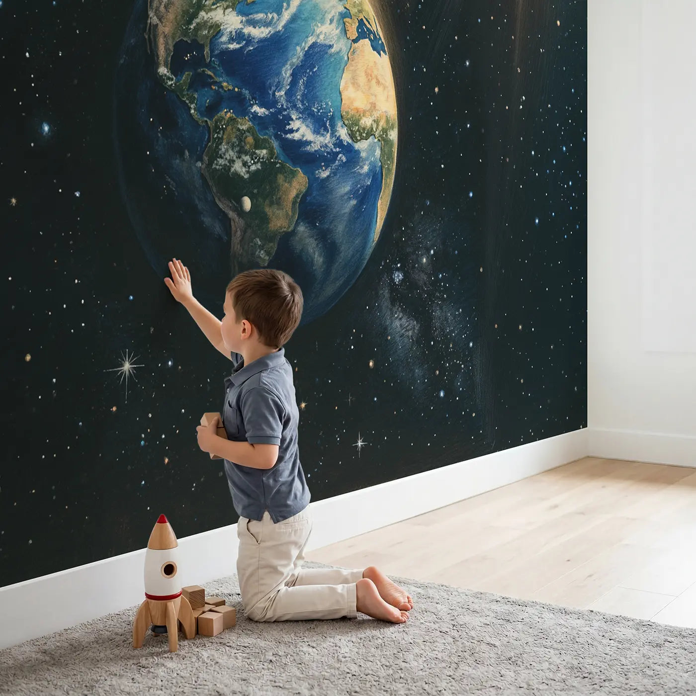 Child in nursery with Planet Earth Fragile Blue Marble Wallpaper Mural by Whimsy Tots