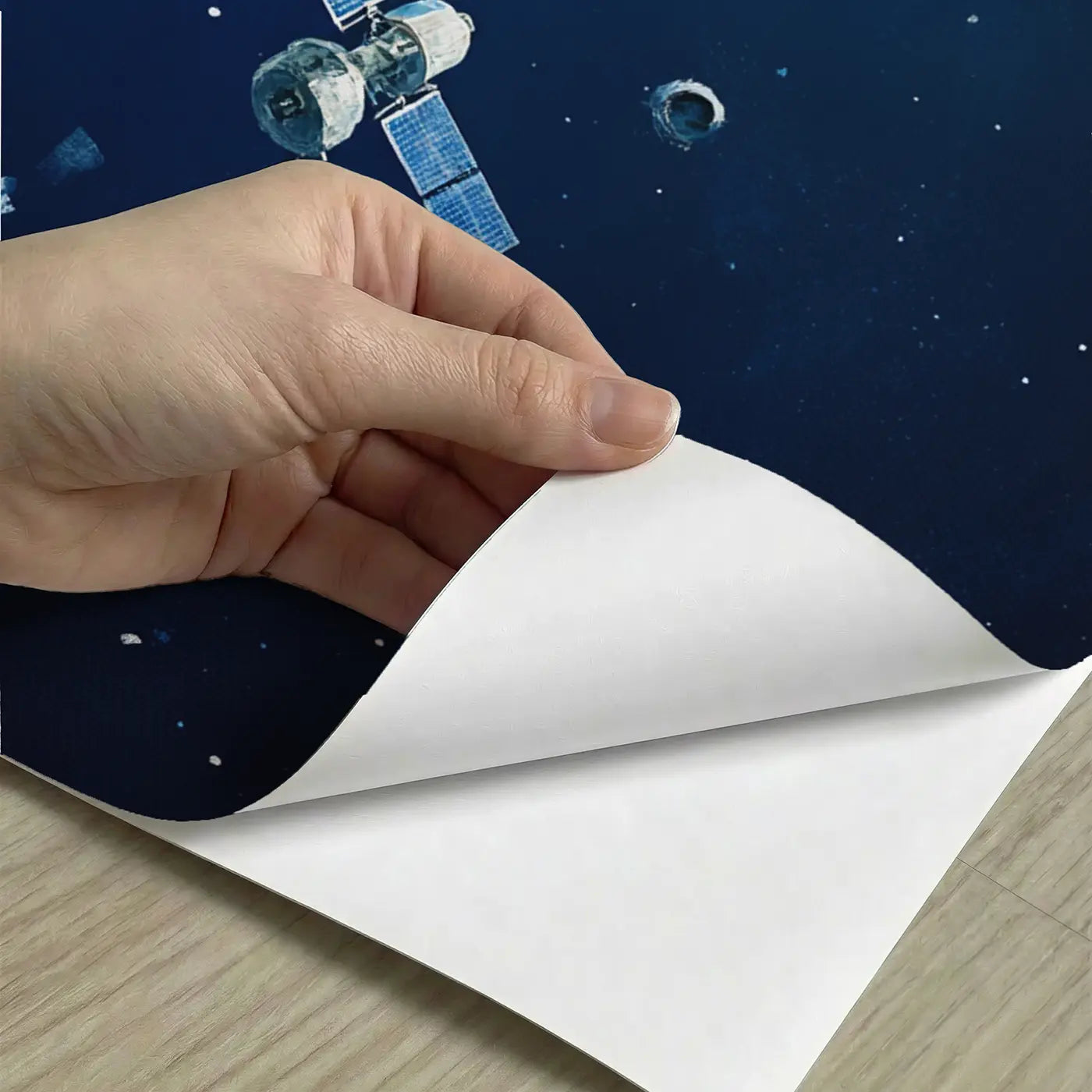 Peel-and-stick detail of Floating Satellites Over Earth Wallpaper Mural by Whimsy Tots