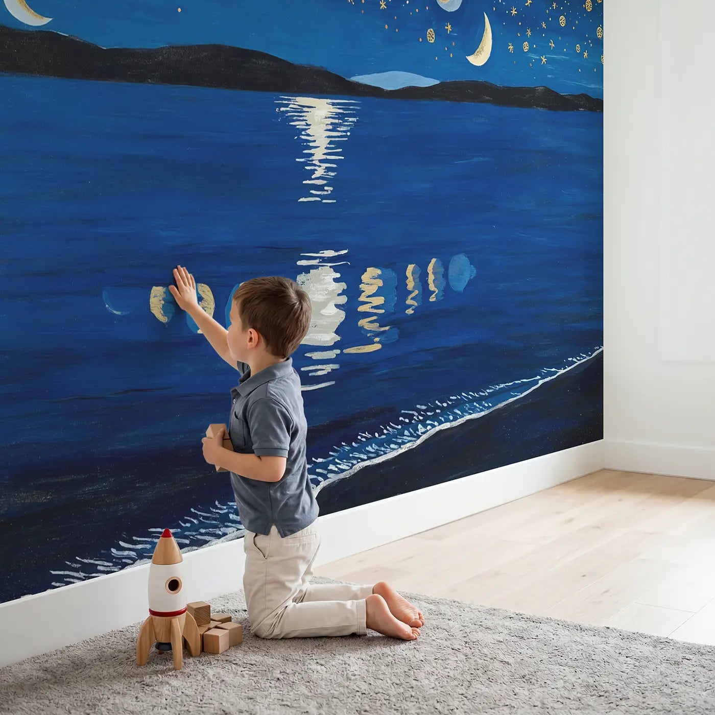 Child in nursery with Moon Phases Ocean Reflection Wallpaper Mural by Whimsy Tots