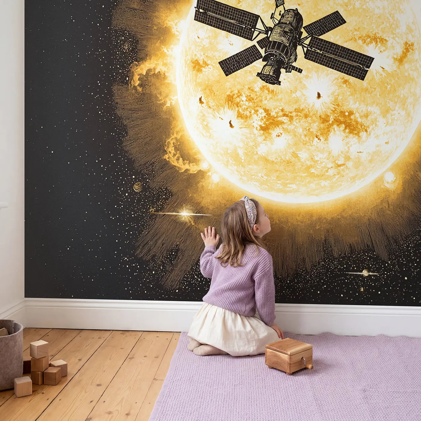 Child in nursery with Space Station Sun Transit Wallpaper Mural by Whimsy Tots