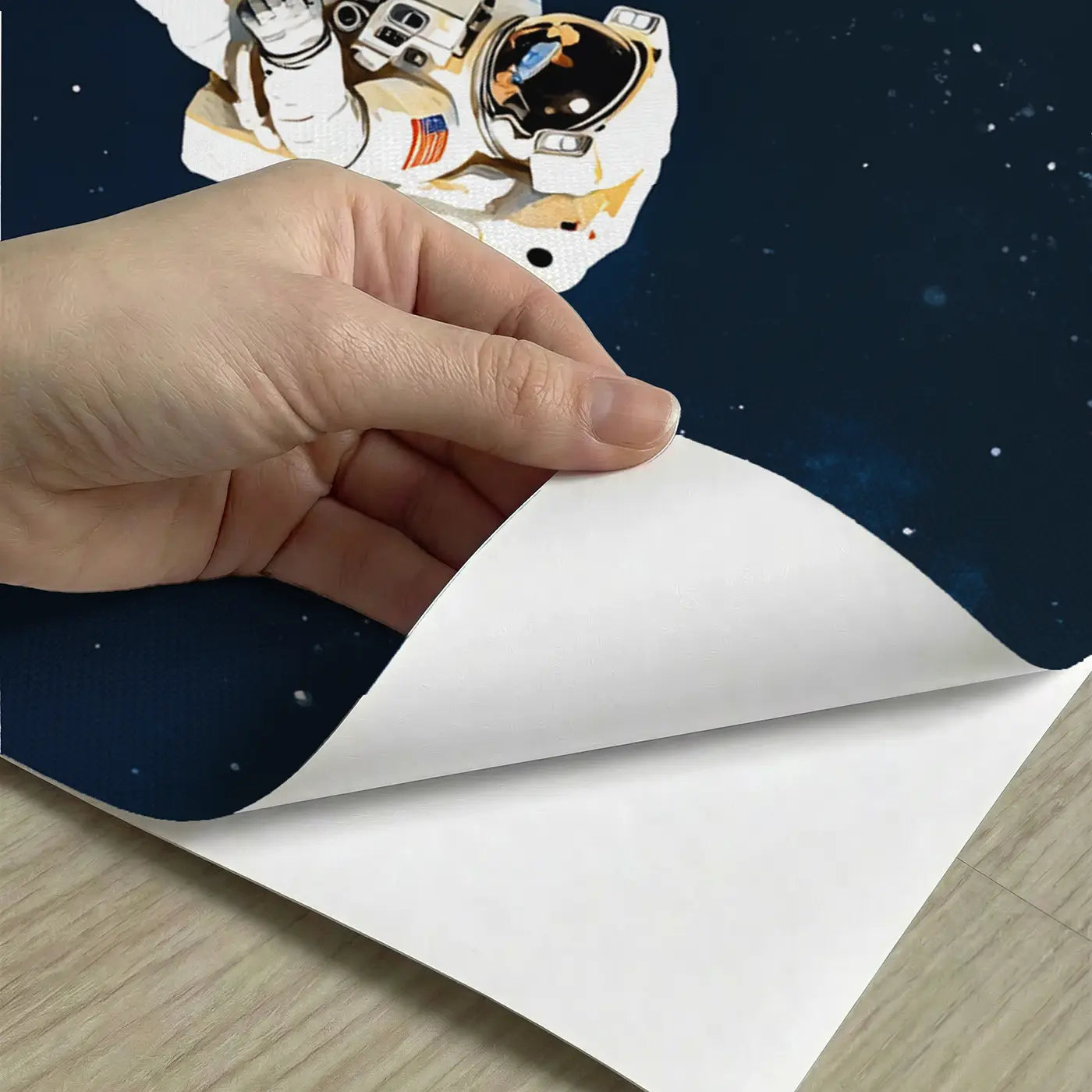 Peel-and-stick detail of Astronaut Space Walk Wallpaper Mural by Whimsy Tots