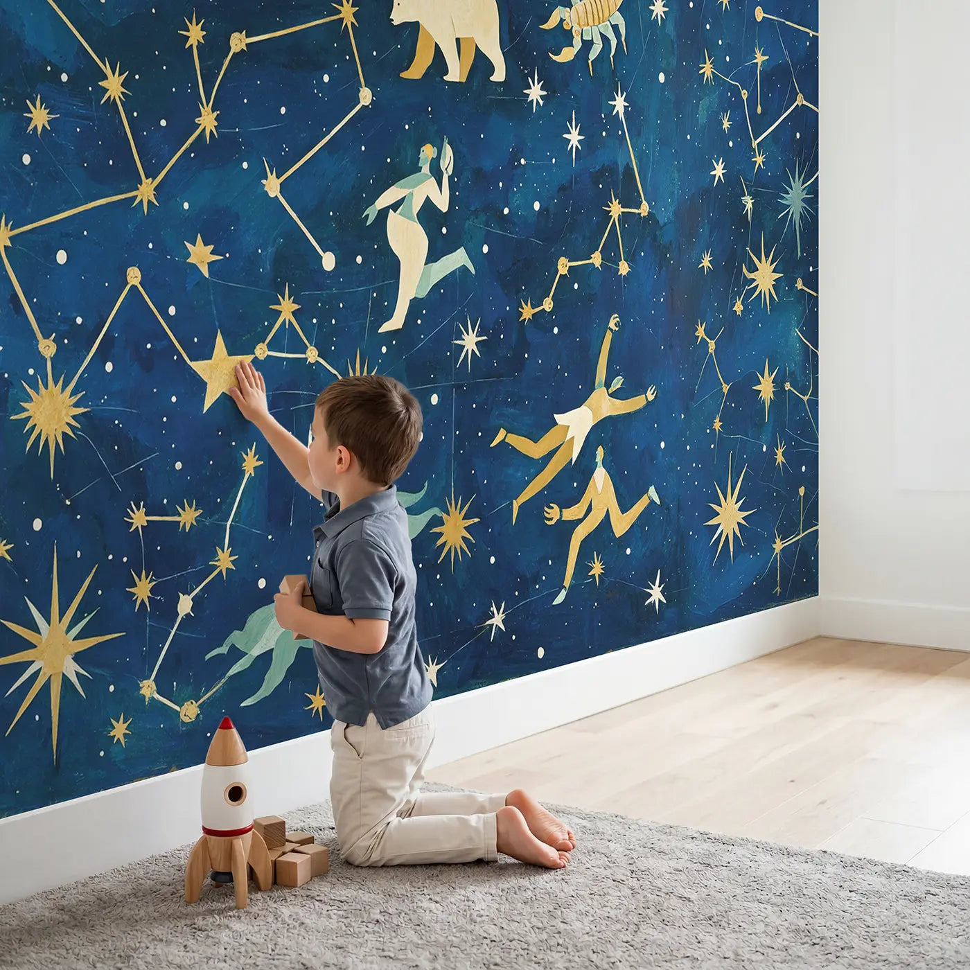 Child in nursery with Illustrated Star Map Wallpaper Mural by Whimsy Tots