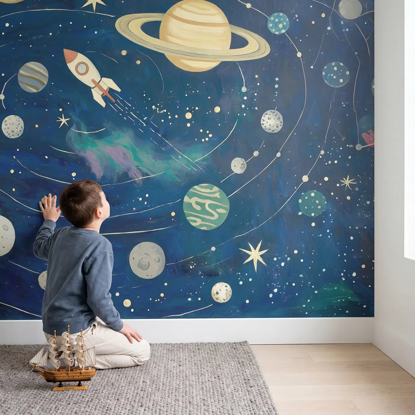 Child in nursery with Solar System Explorer Wallpaper Mural by Whimsy Tots