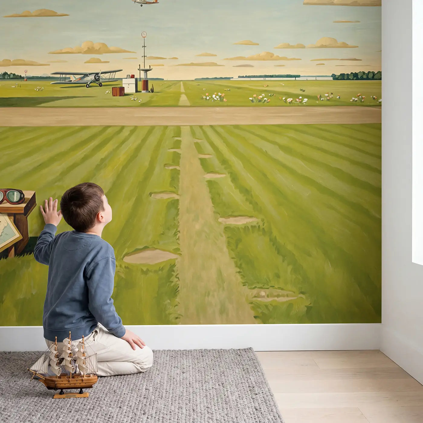 Child in nursery with Vintage Airfield Panorama Wallpaper Mural by Whimsy Tots