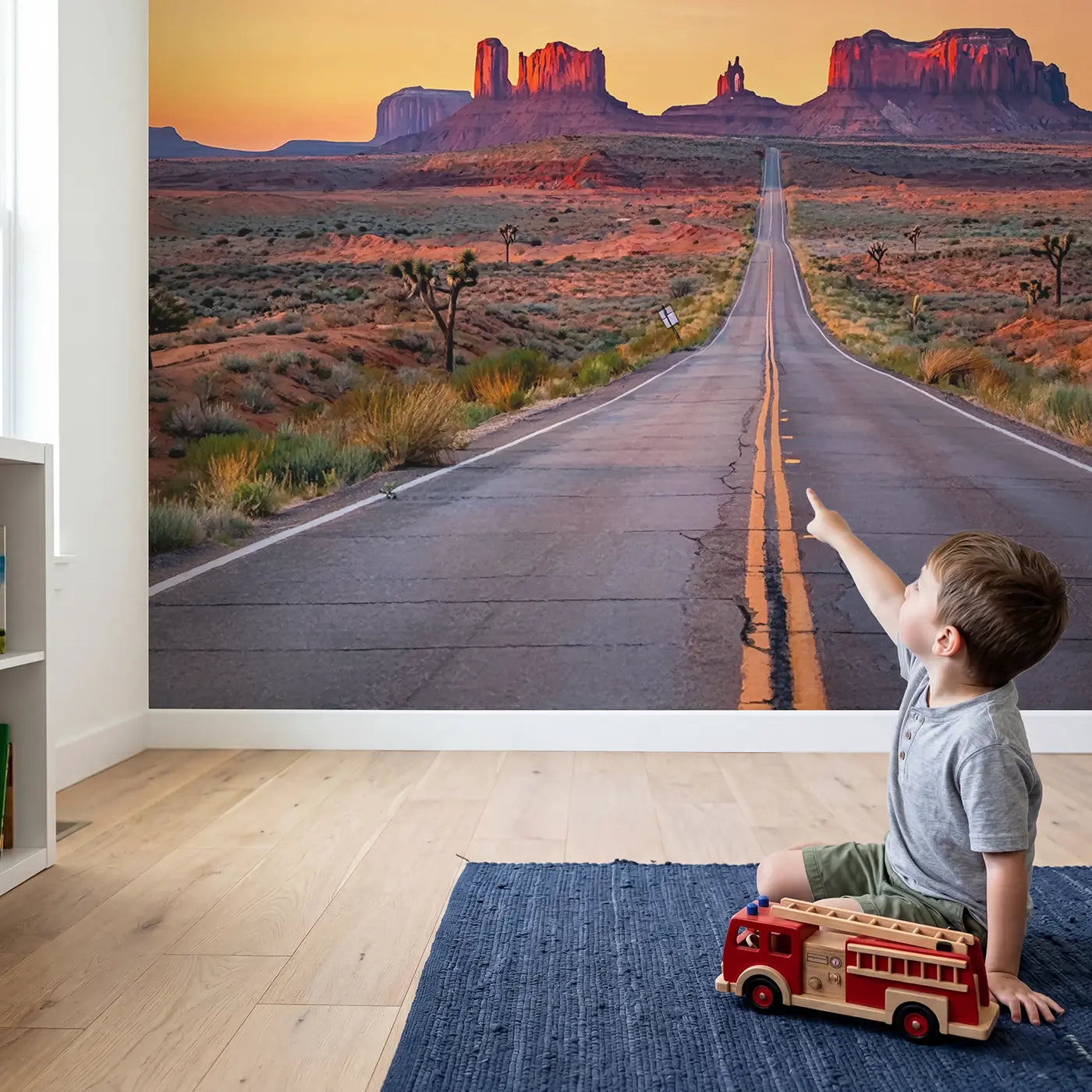 Child in nursery with Desert Highway to Buttes Wallpaper Mural by Whimsy Tots