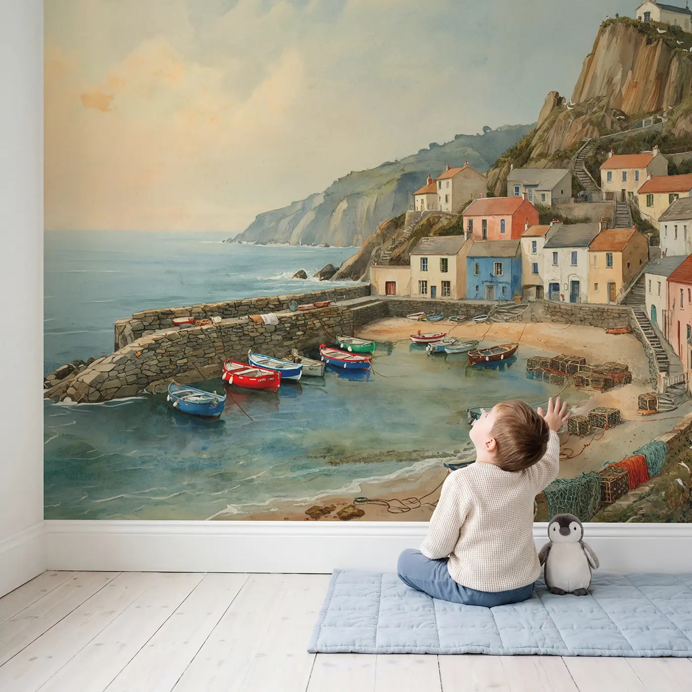 Child in nursery with Cliff Cove Fishing Village Wallpaper Mural by Whimsy Tots
