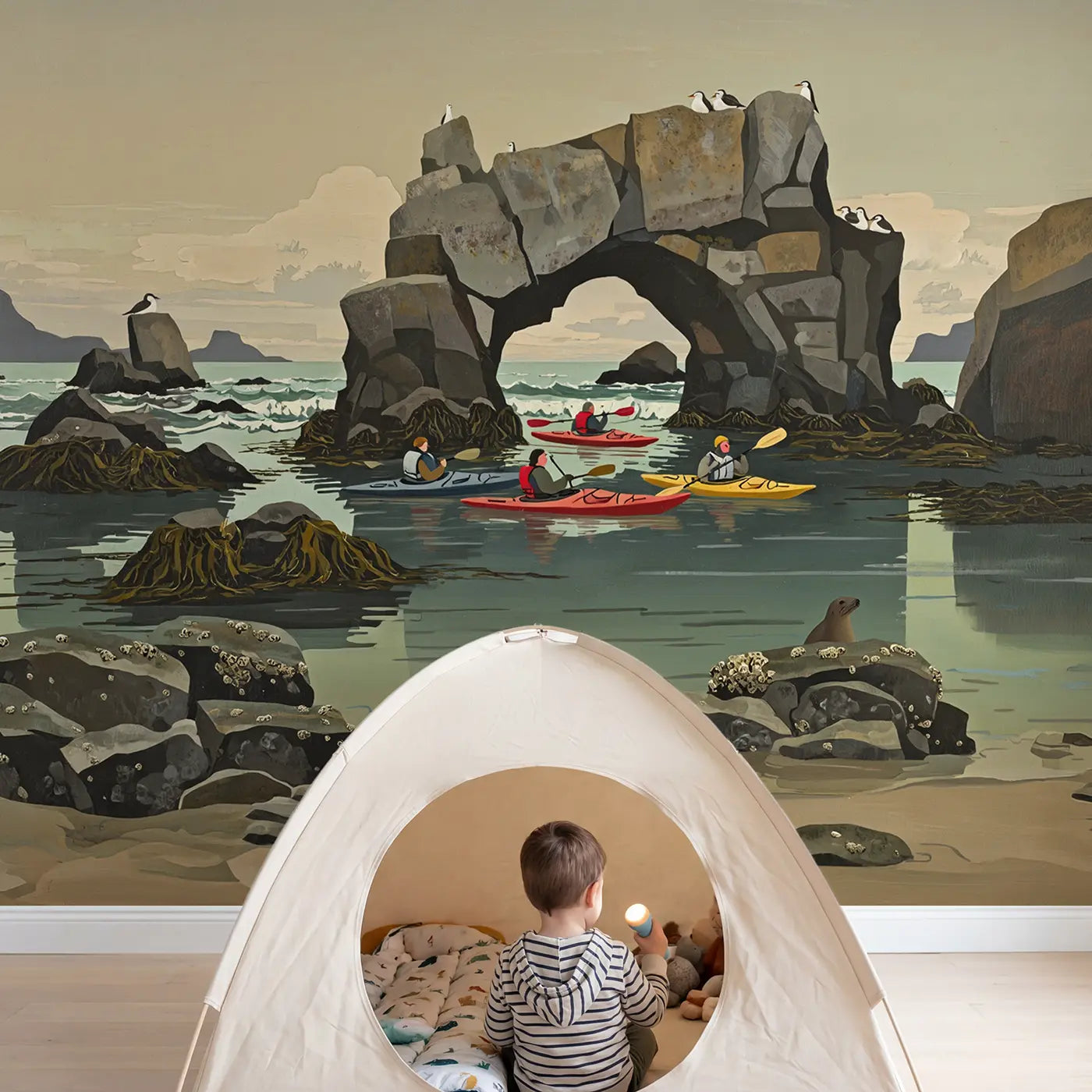 Child in nursery with Coastal Cove Kayak Adventure Wallpaper Mural by Whimsy Tots