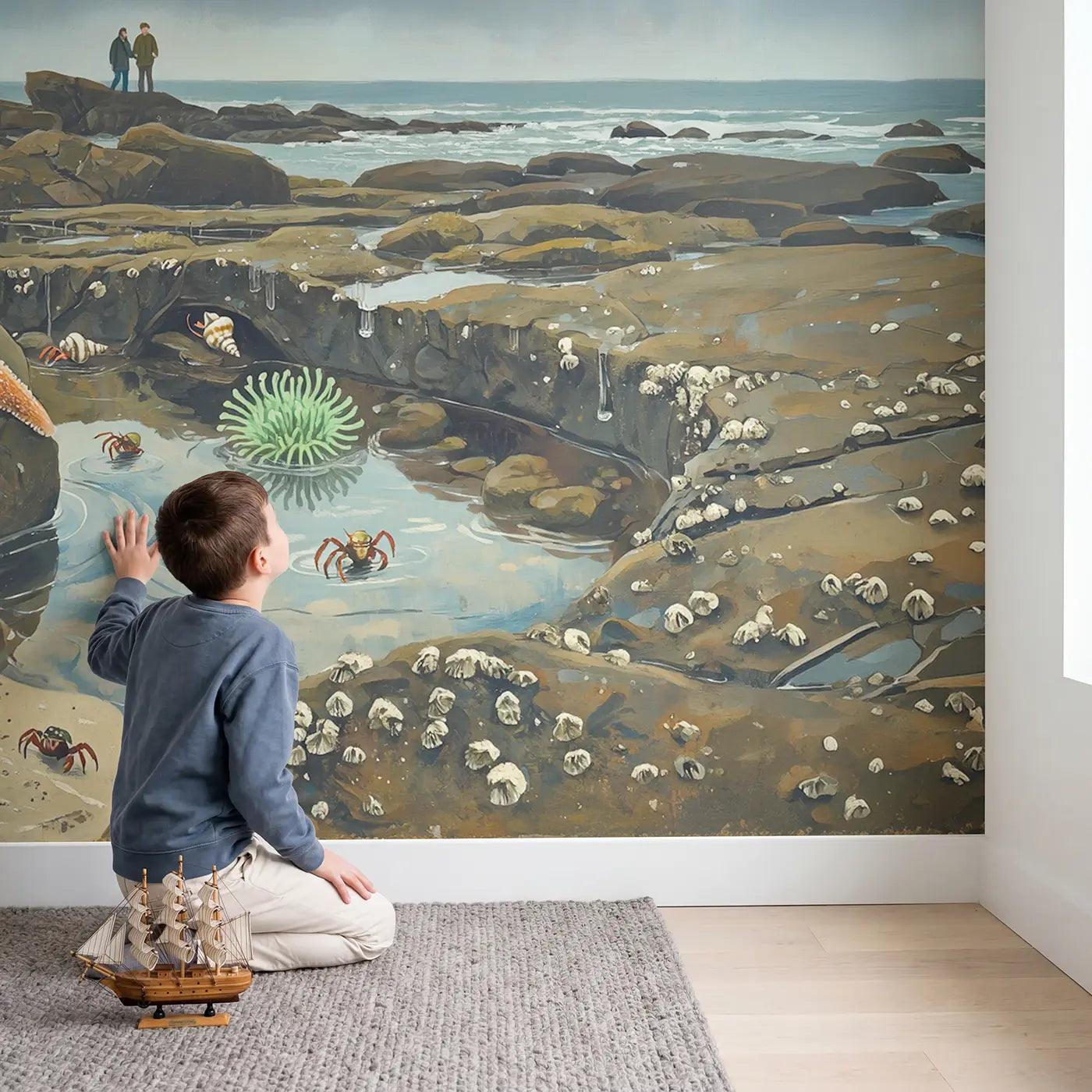 Child in nursery with Rocky Shore Tide Pool Discovery Wallpaper Mural by Whimsy Tots
